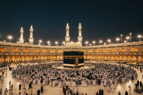 Masjid al-Haram in Mecca illuminated at night with pilgrims performing Tawaf